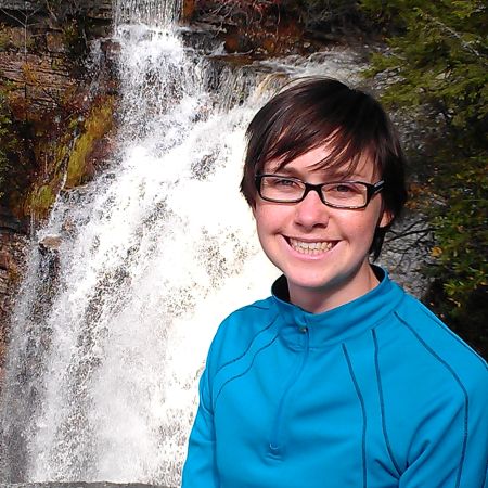 Allyson Salisbury in front of waterfall